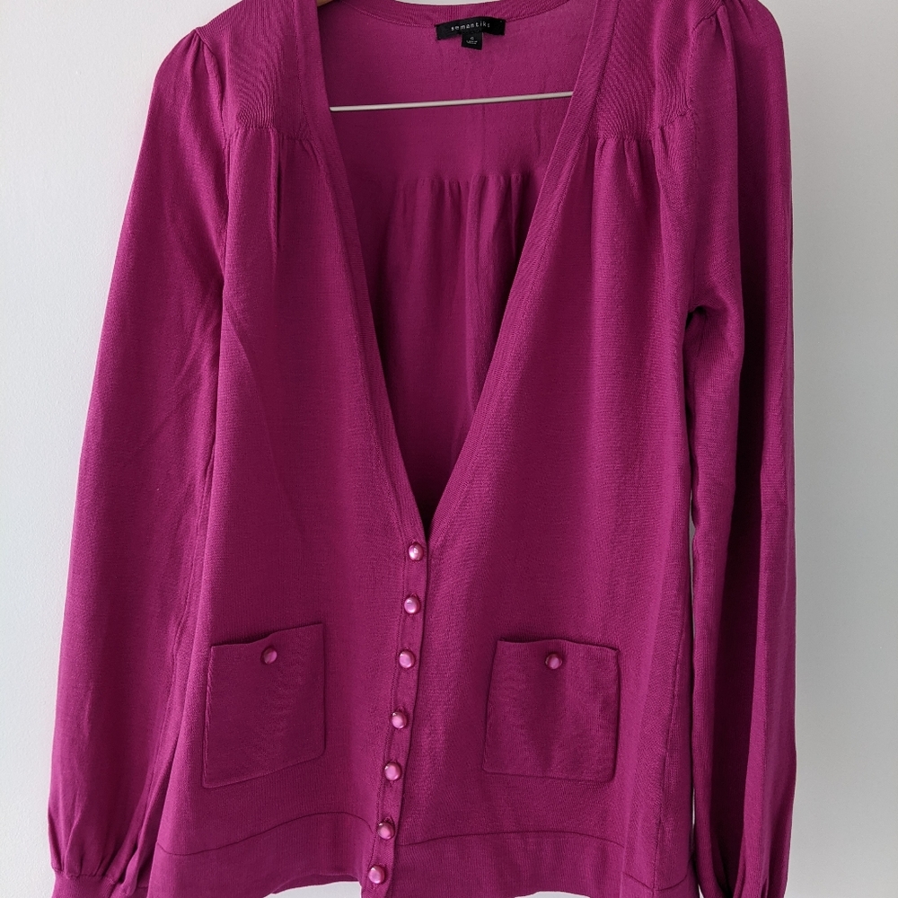 Deep pink v-neck cardigan with pink buttons